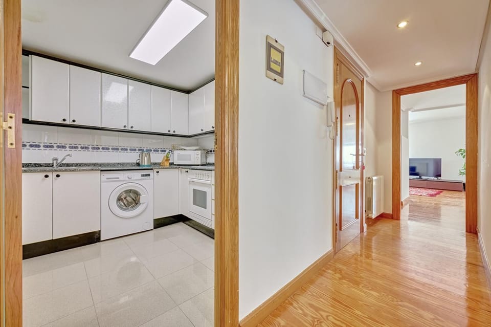 Kitchen or kitchenette, washing machine