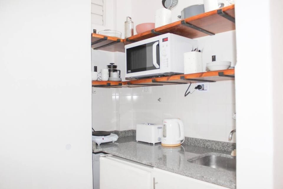 Kitchen or kitchenette, minibar, kitchen
