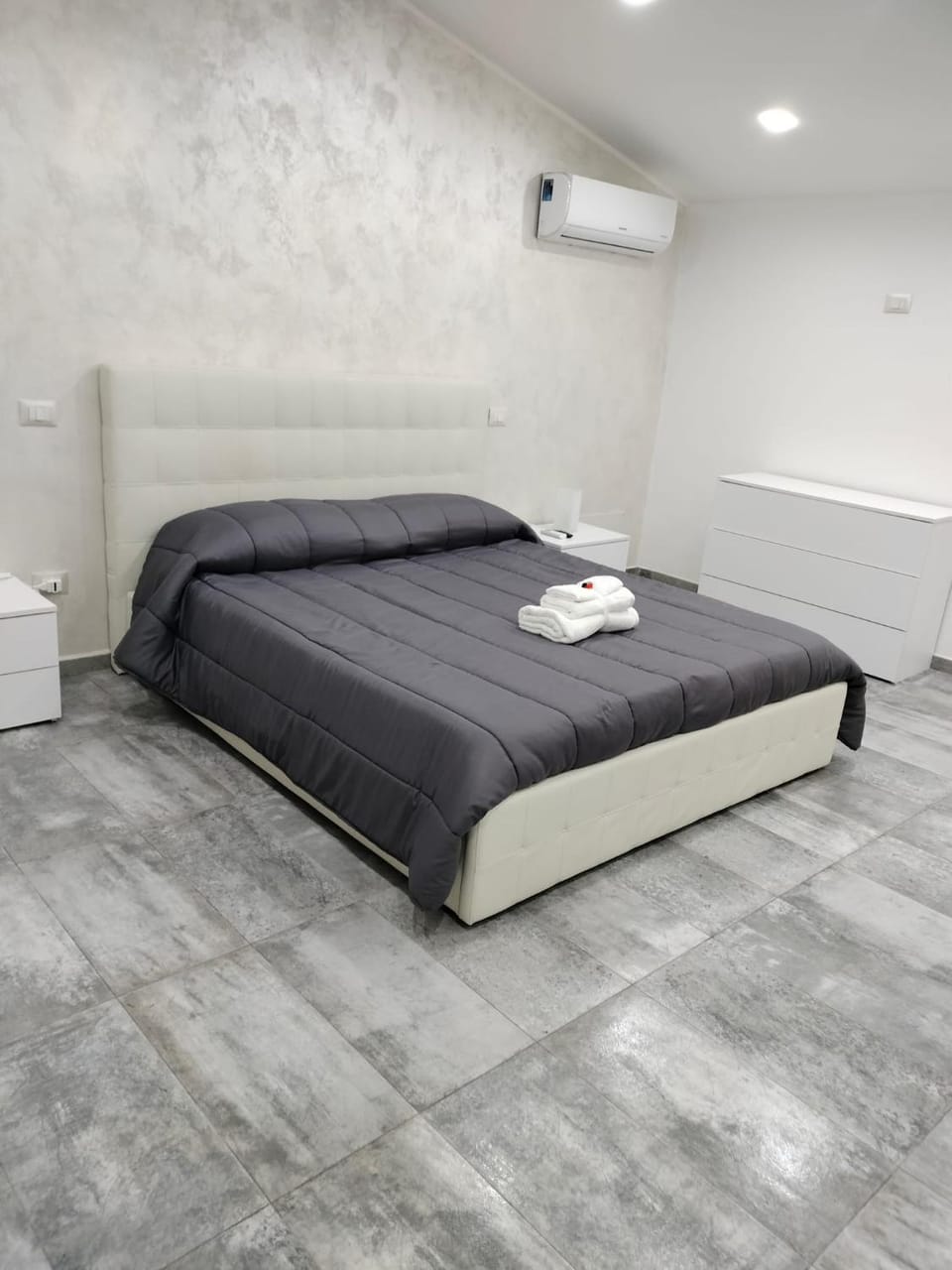 Bed, Photo of the whole room, Bedroom, towels, air conditioner