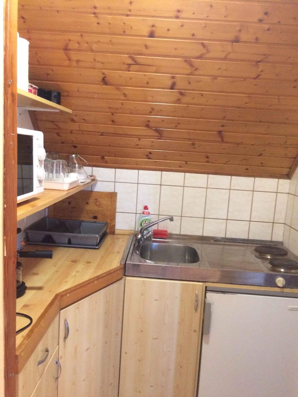 Kitchen or kitchenette, microwave