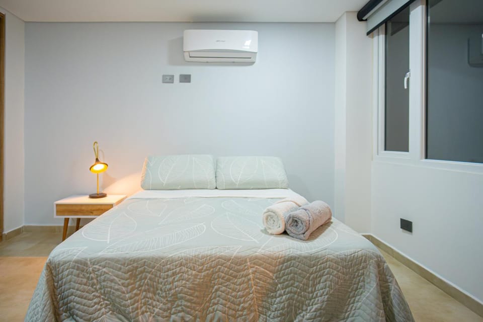 Bed, Photo of the whole room, Bedroom, towels, air conditioner