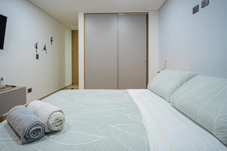 Bed, Photo of the whole room, Bedroom, towels, wardrobe