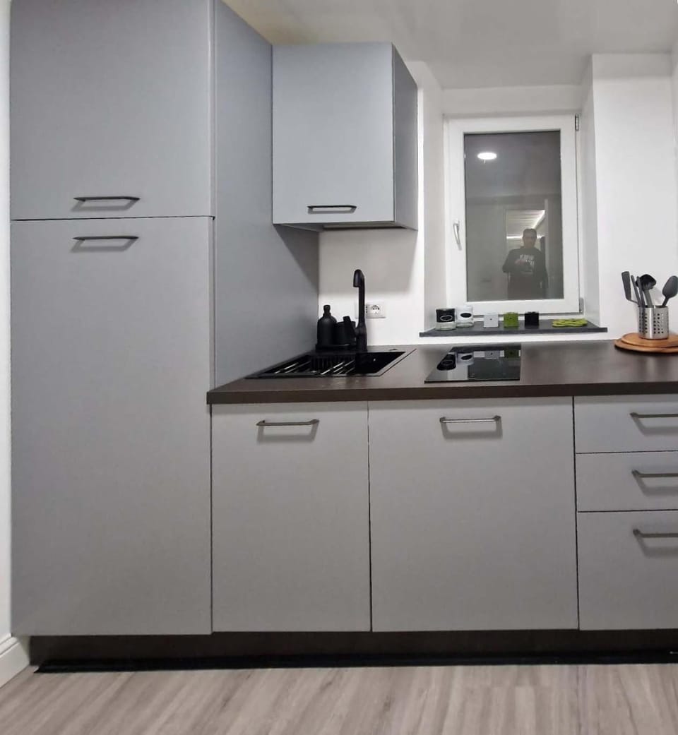 Kitchen or kitchenette, stove