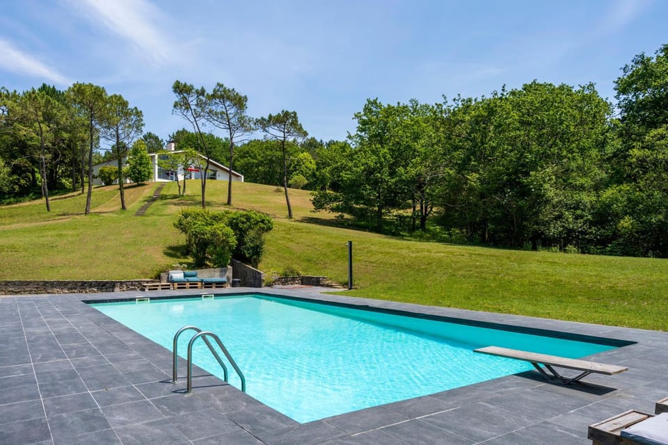 Property building, Living room, Swimming pool