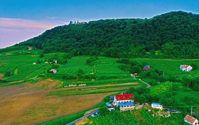 Property building, Nearby landmark, Spring, Natural landscape, Mountain view
