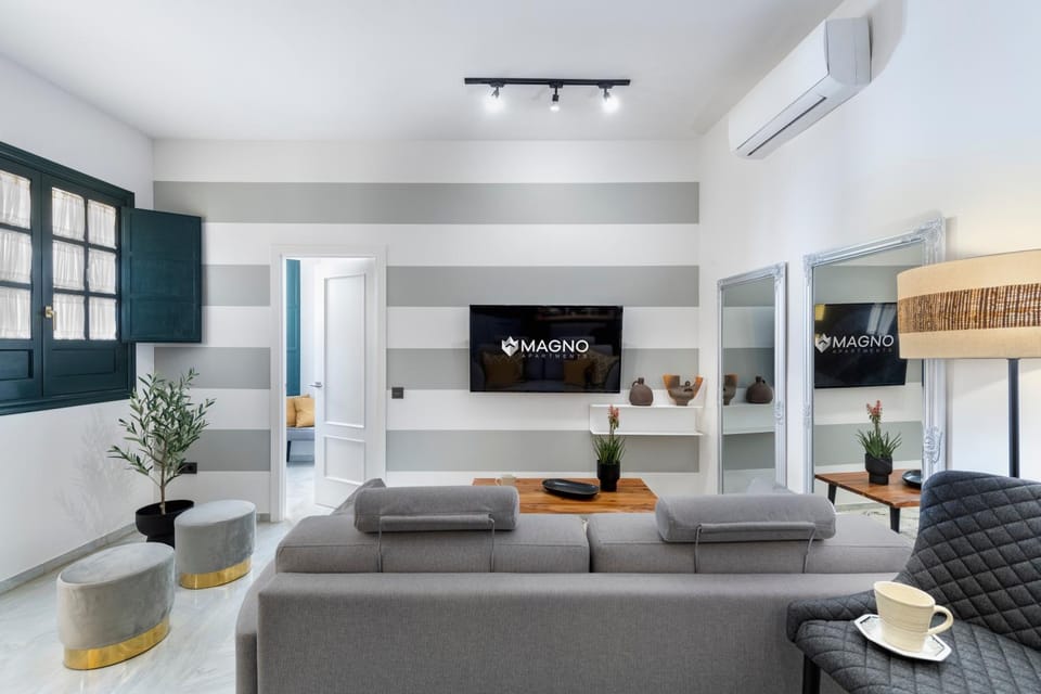 TV and multimedia, Kitchen or kitchenette, Living room, Seating area, air conditioner