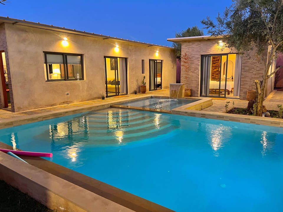 Property building, Night, Pool view, Swimming pool, Swimming pool, sunbed