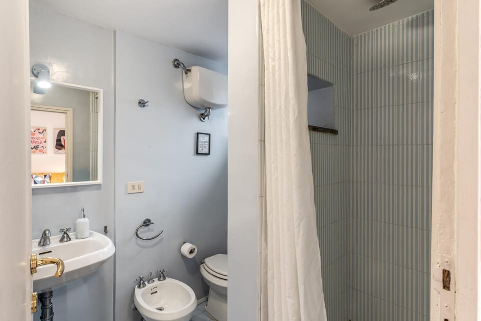 Shower, Toilet, Bathroom, bidet, towels, washing machine