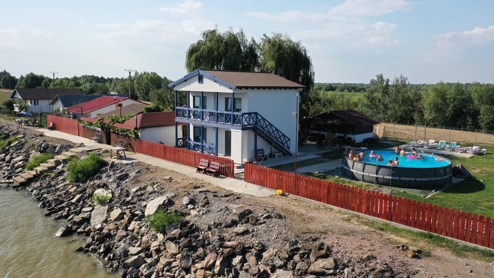 Property building, Day, Natural landscape, Pool view, River view, Swimming pool