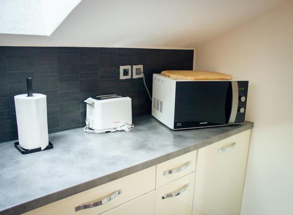 Kitchen or kitchenette, oven, toaster, kitchen