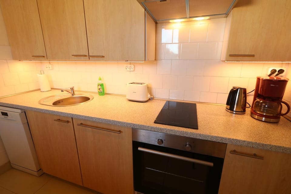 Kitchen or kitchenette, toaster