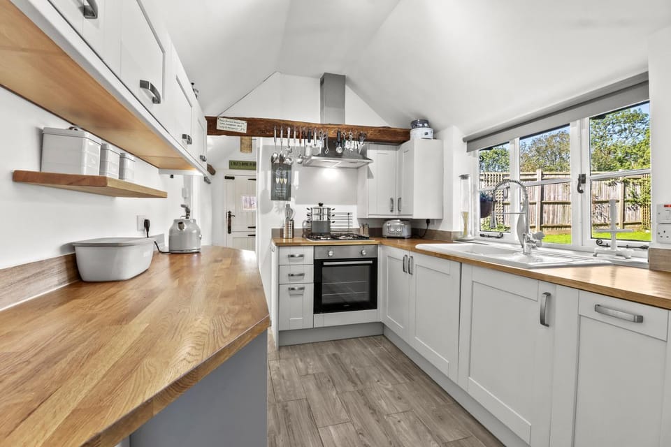 Kitchen or kitchenette, stove, kitchen