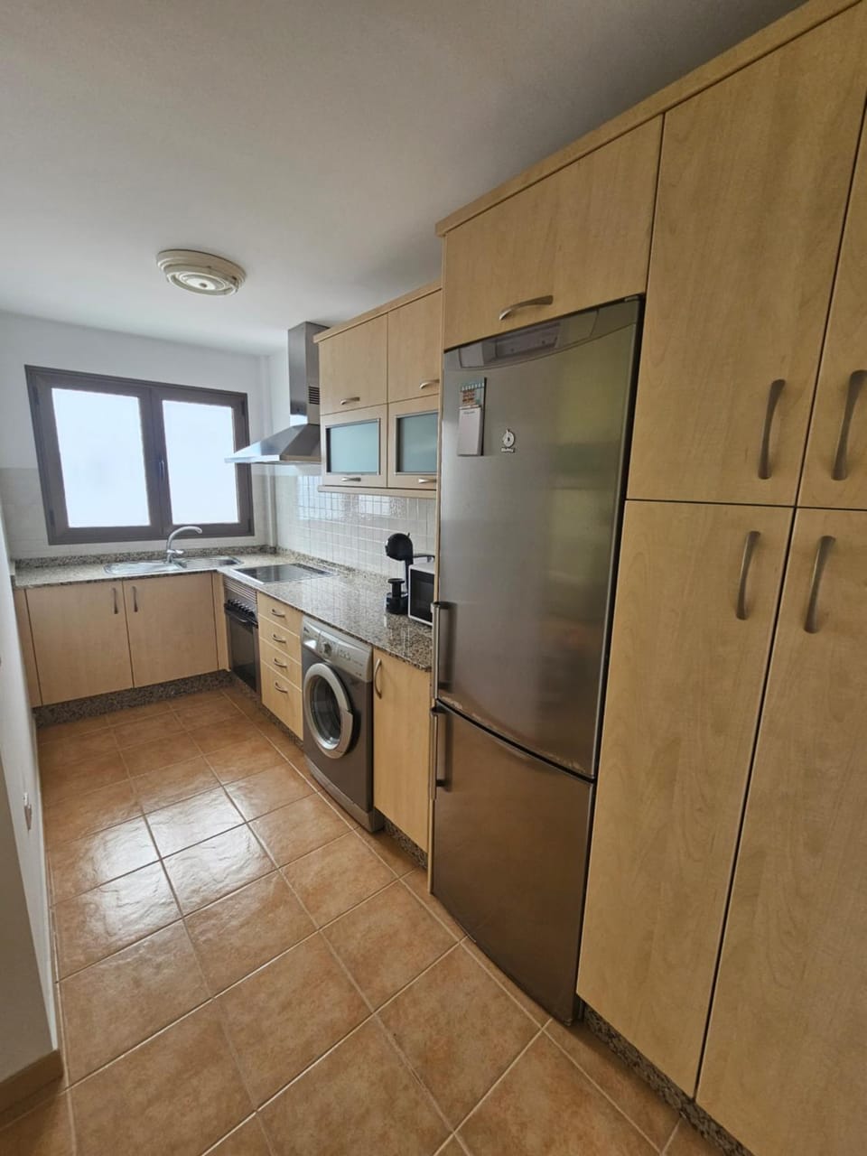 Kitchen or kitchenette, pet friendly, stove, washing machine