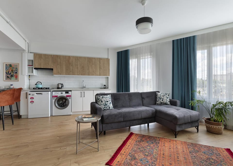 Kitchen or kitchenette, Seating area, Dining area, dishwasher, stove, washing machine