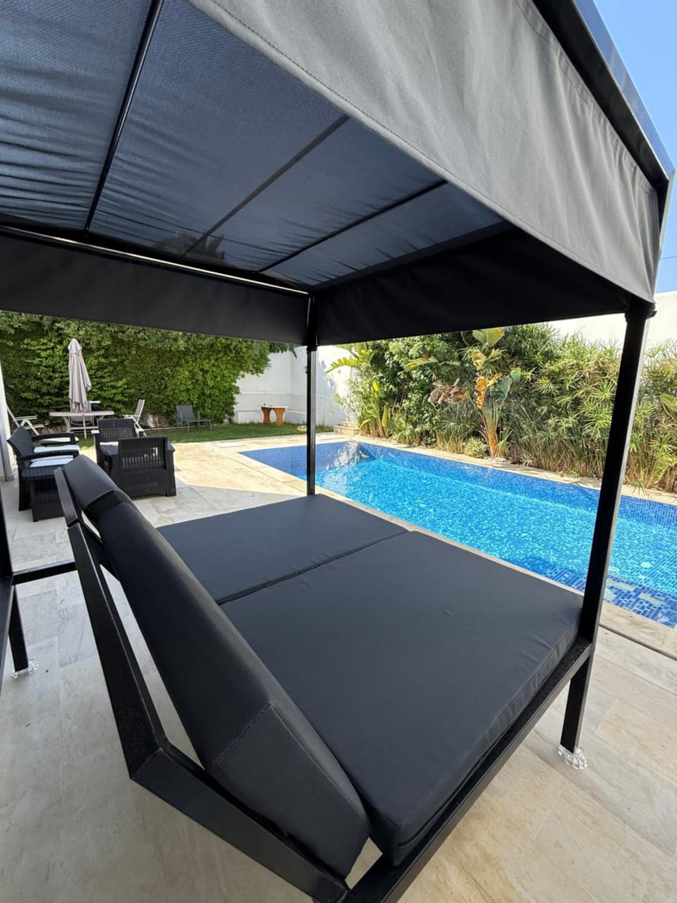 Patio, Day, Pool view, Swimming pool, sunbed