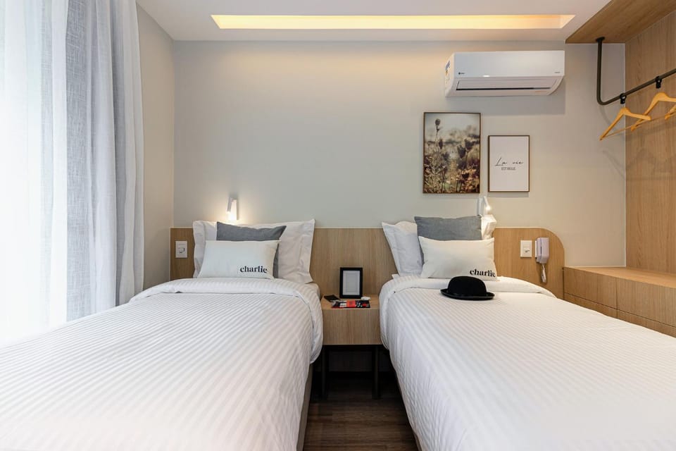 Bed, Photo of the whole room, Bedroom, towels, air conditioner