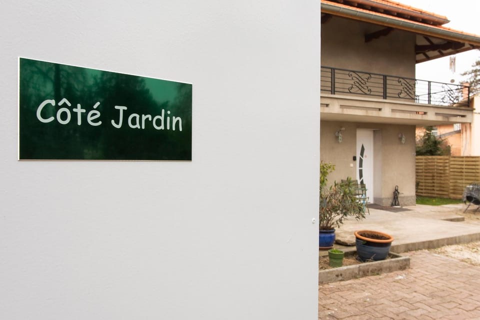 Day, Property logo or sign, Text overlay
