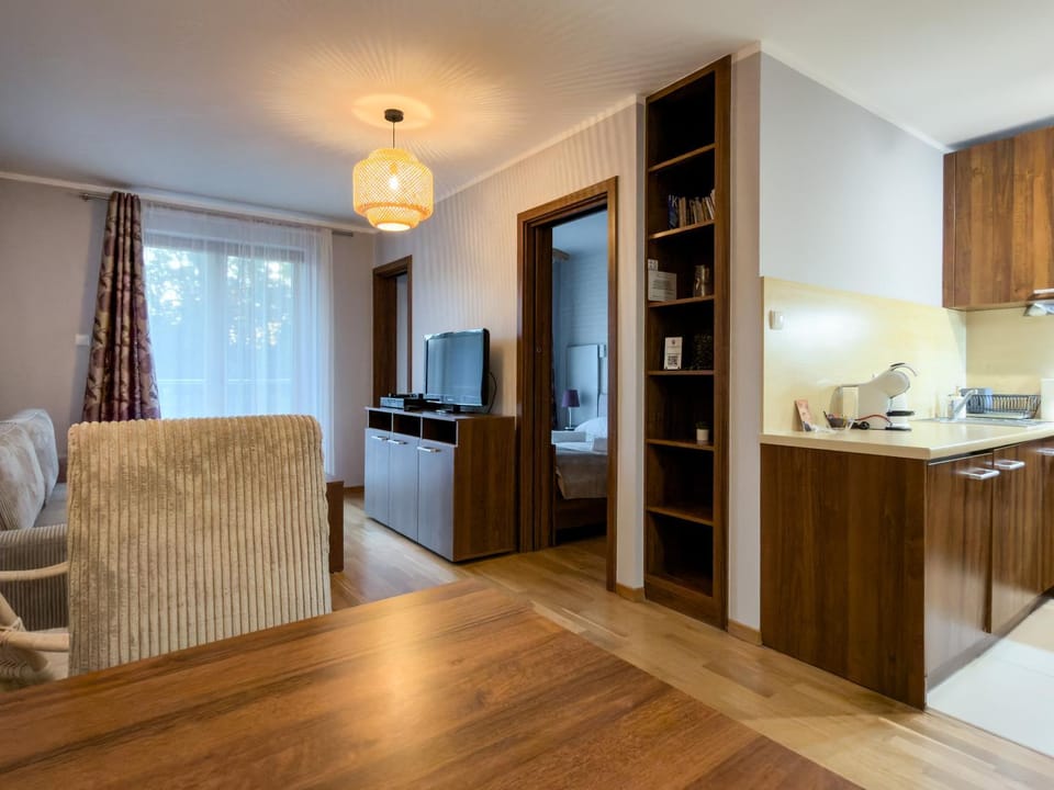 Kitchen or kitchenette, Living room, Seating area, Dining area