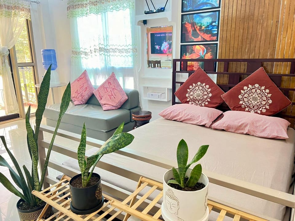 Bed, Living room, Seating area, Bedroom