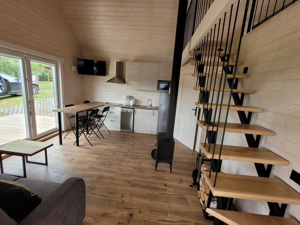 APANÓWKA domki z balią jacuzzi sauną pomostem łódką Chalet in Pomeranian Voivodeship