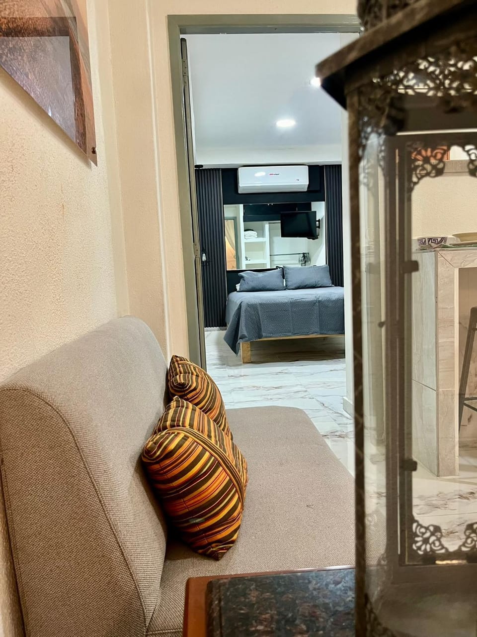 Bed, Living room, Seating area, Bedroom