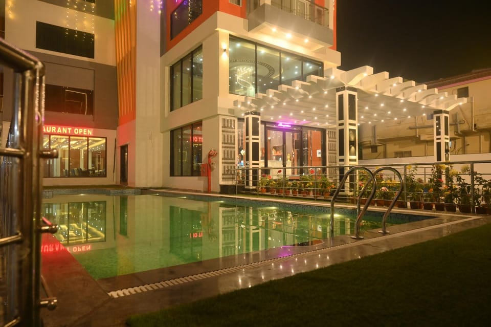 Property building, Night, Swimming pool