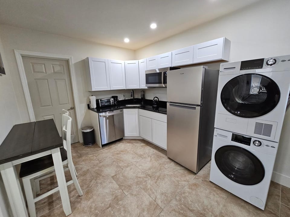 Dining area, dishwasher, stove, washing machine, dryer