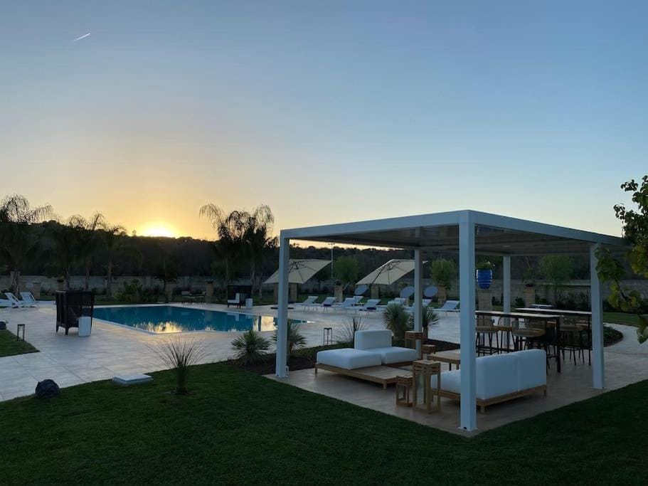 Patio, Natural landscape, Pool view, Swimming pool, Sunset, sunbed