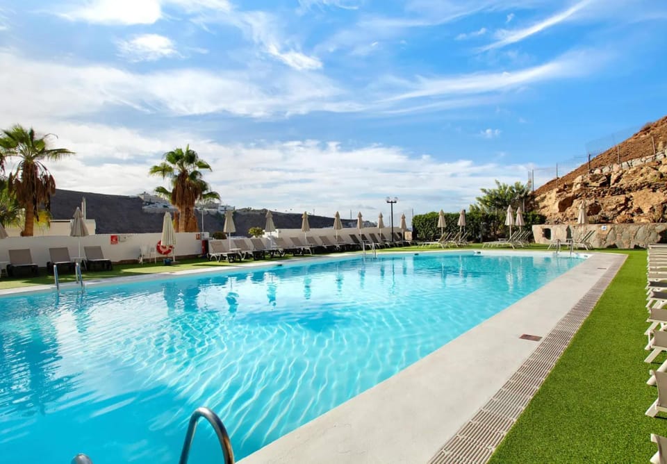 Property building, Living room, Swimming pool