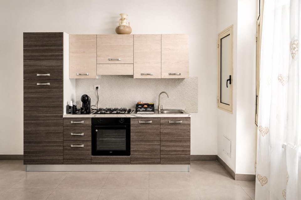 Kitchen or kitchenette, oven, stove