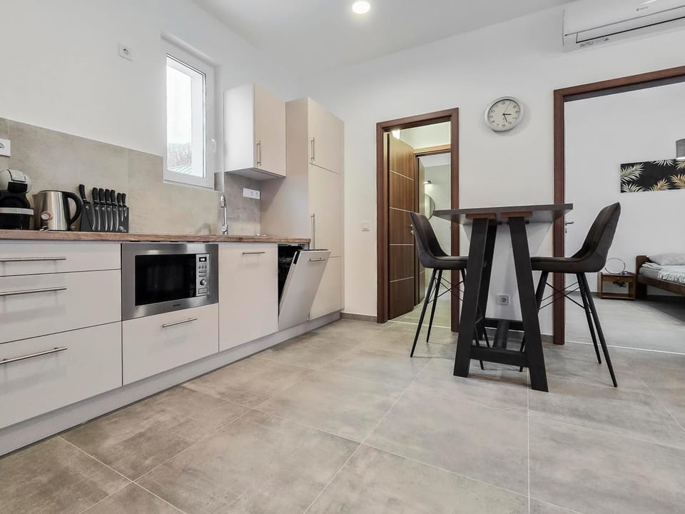 Dining area, dishwasher, microwave, kitchen