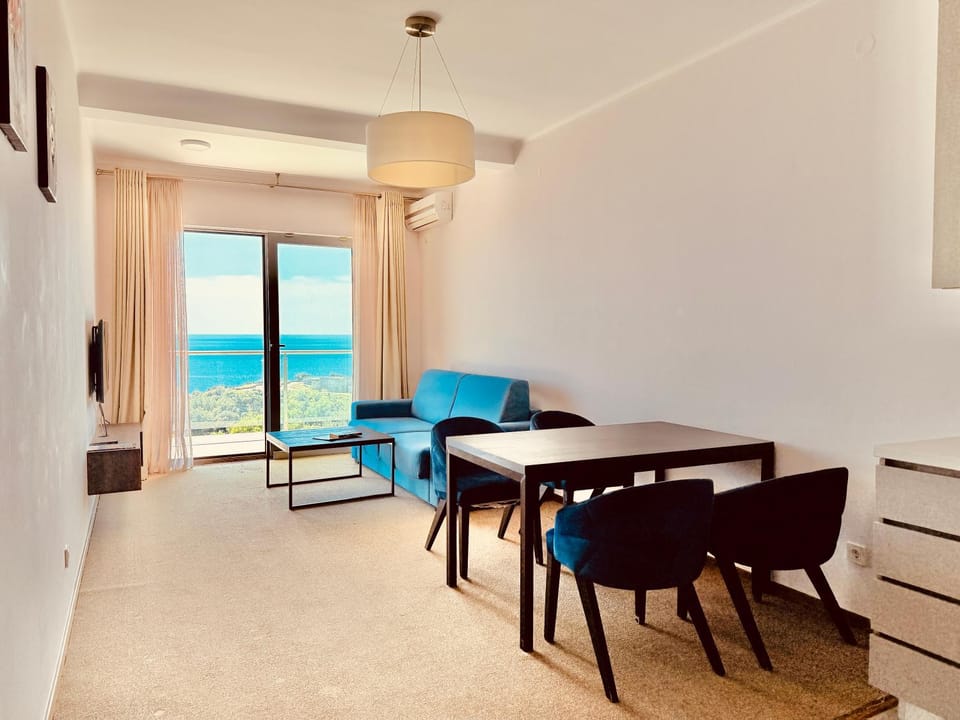 Living room, Seating area, Dining area, Sea view