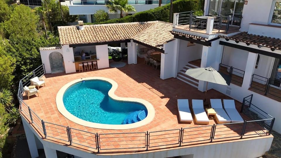 Property building, Living room, Swimming pool