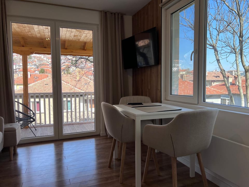 View (from property/room), Living room, Seating area, Dining area