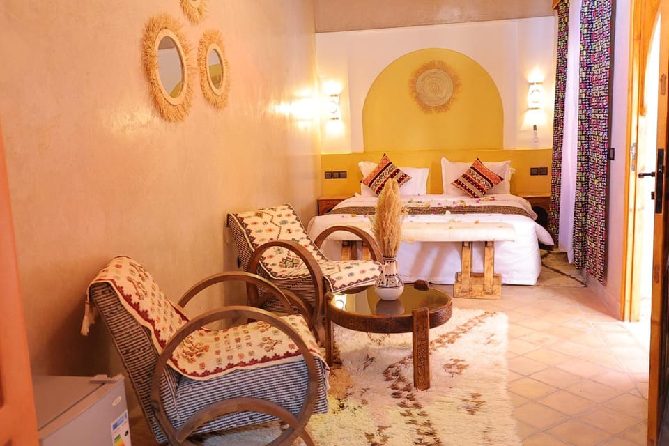 Bed, Living room, Seating area, Bedroom