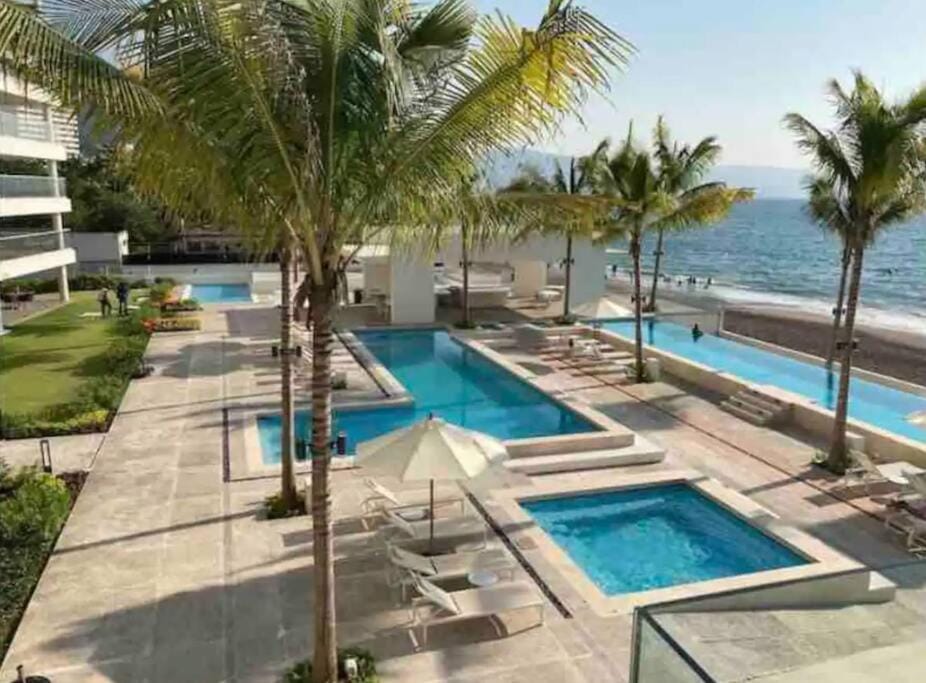 Beach, Pool view, Swimming pool, sunbed