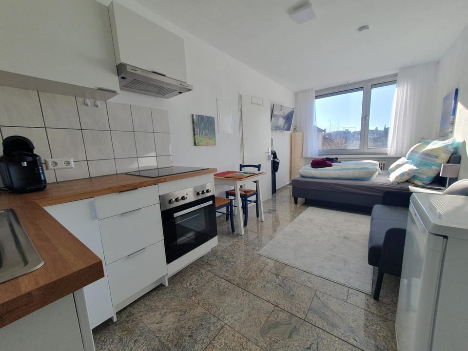 Kitchen or kitchenette, Living room, Seating area, Dining area, minibar, stove