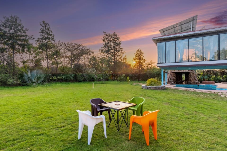 Property building, Patio, Spring, Day, Garden, Living room, Seating area, Dining area, Garden view, Pool view, Swimming pool