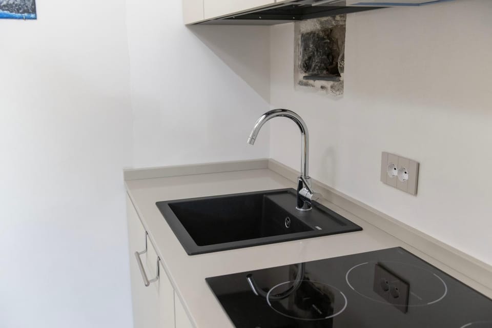 Kitchen or kitchenette, stove