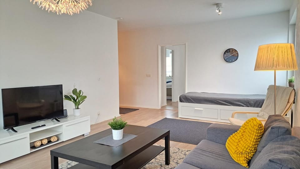 Bed, TV and multimedia, Living room, Seating area