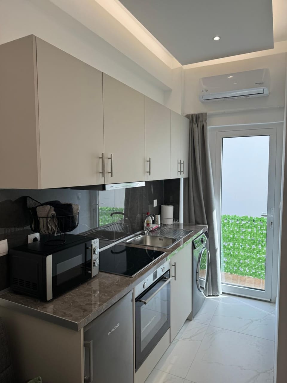 Kitchen or kitchenette, oven, stove