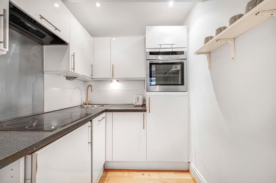 Kitchen or kitchenette, dishwasher, oven, stove, kitchen