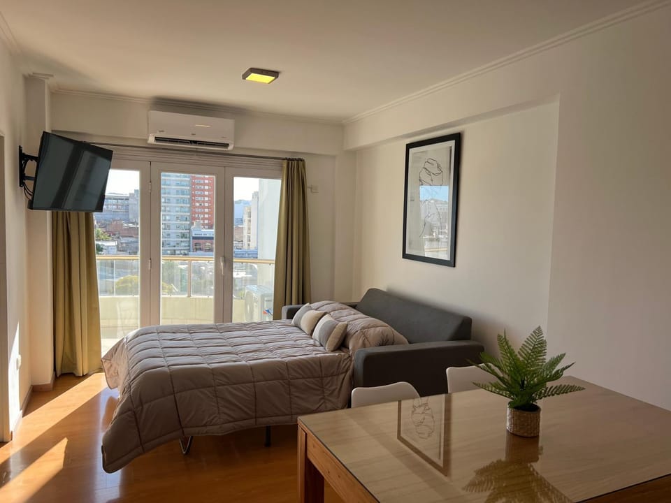 Bed, TV and multimedia, Living room, Photo of the whole room, Seating area