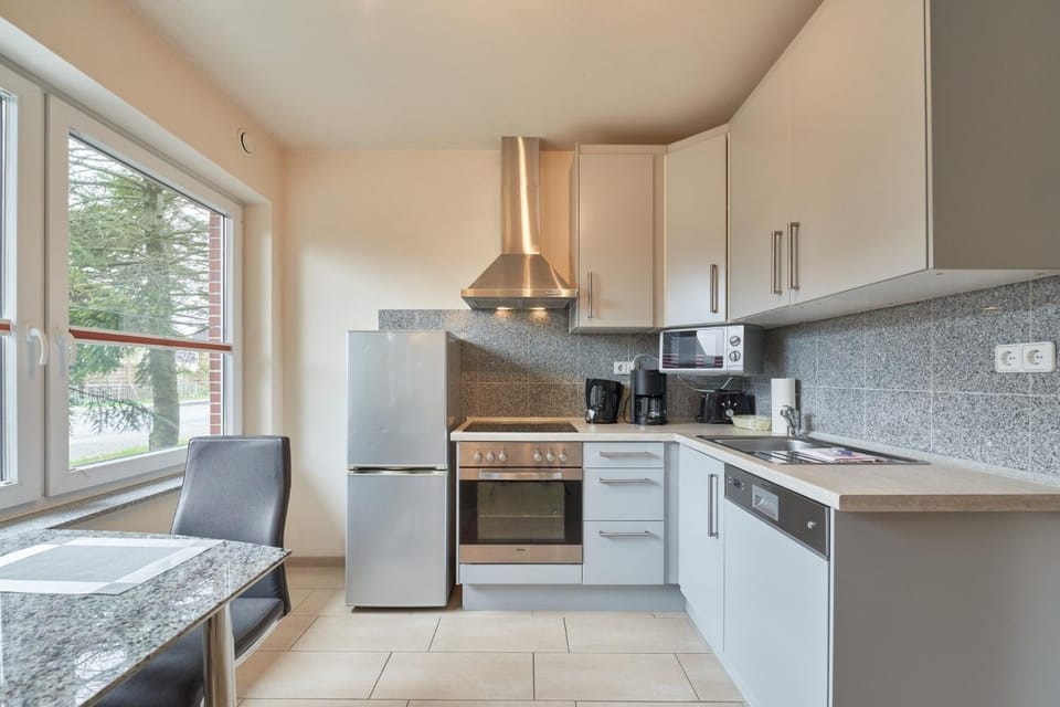 Kitchen or kitchenette, Dining area, dishwasher, oven, stove, toaster