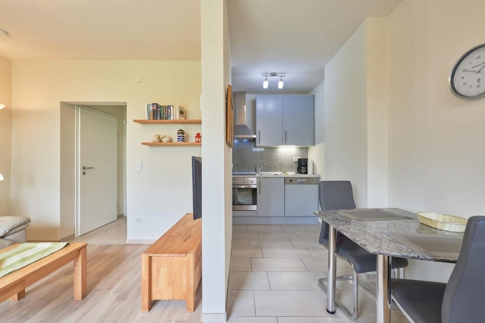 Kitchen or kitchenette, Living room, Seating area, Dining area