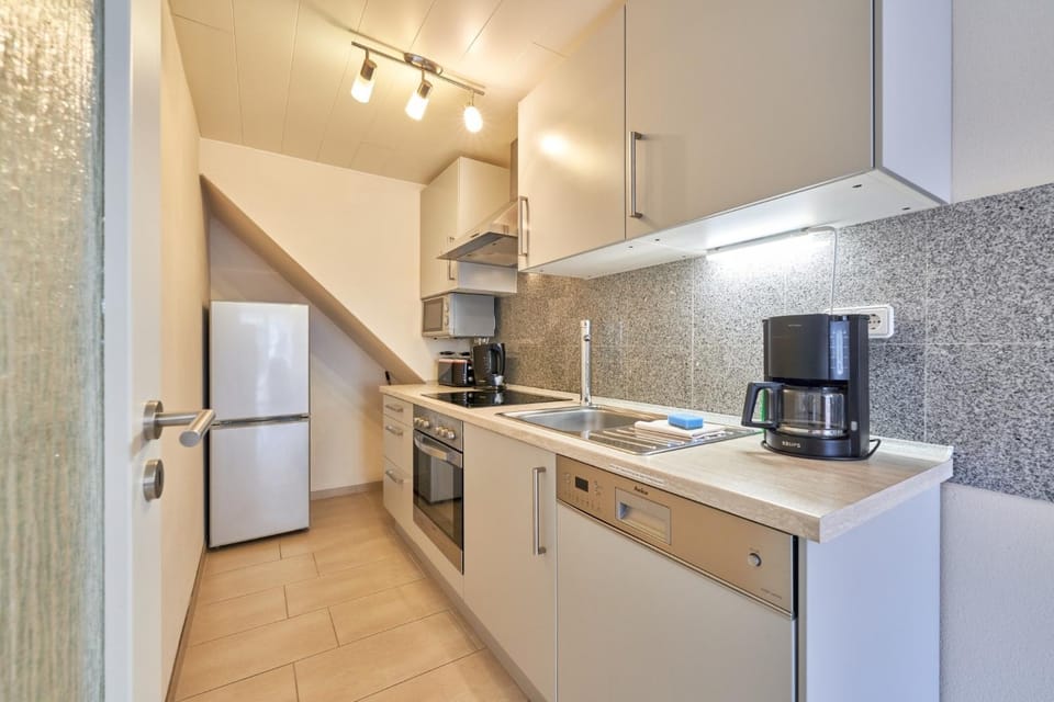 Kitchen or kitchenette, oven, stove, toaster