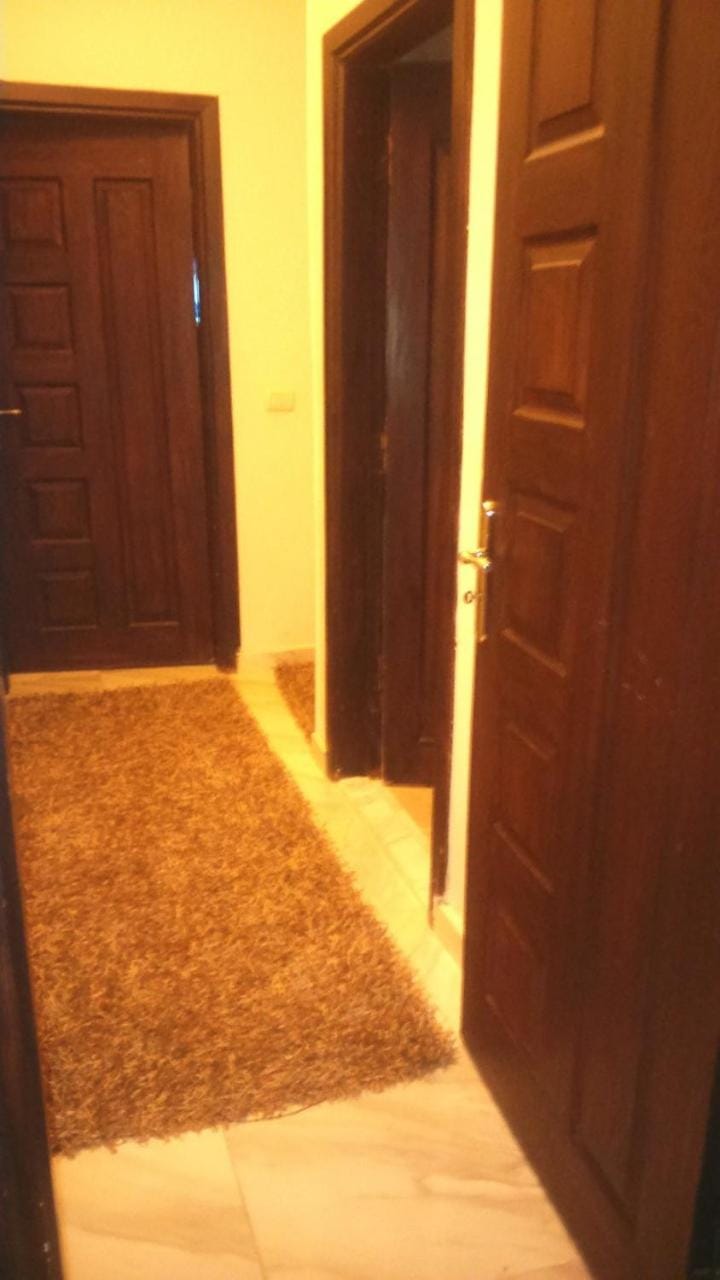 شقة ارضي بحديقة خاصة كمبوند الشيخ زايد Apartment in Egypt