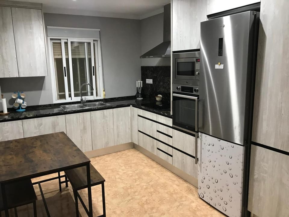 Kitchen or kitchenette, Dining area, oven, stove, toaster, air conditioner