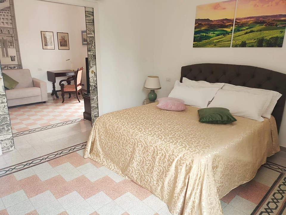 Bed, Living room, Seating area, Bedroom