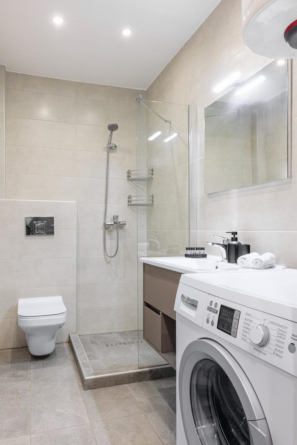 Shower, Toilet, towels, washing machine